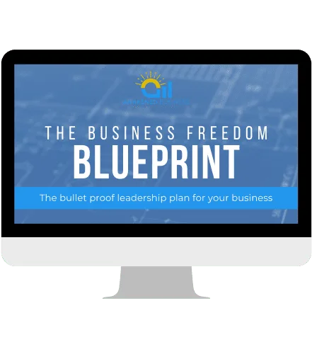 The Business Freedom Blueprint ebook shown on a computer screen