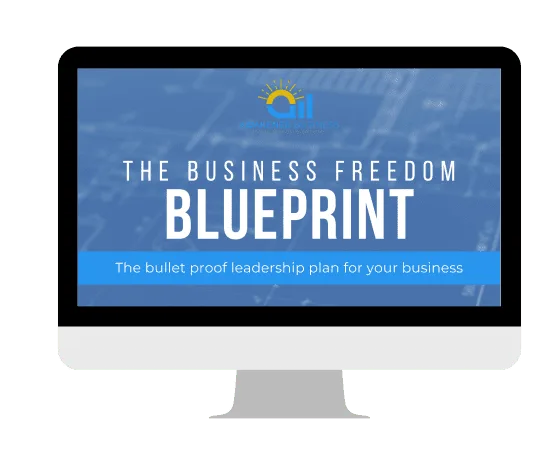 The Business Freedom Blueprint ebook shown on a computer screen